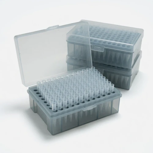 Plasticware, clear pipette tips in stacked racks, representative image
