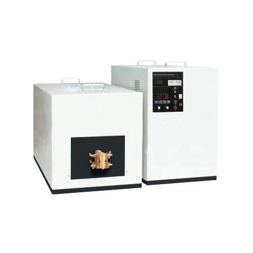 Mid Frequency Induction Heaters, white control cabinet and heating unit with copper terminals