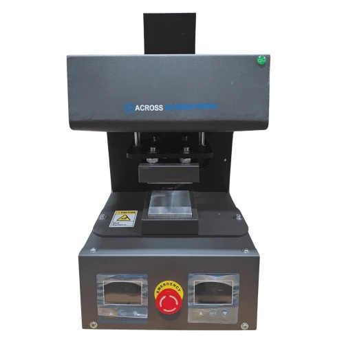 Heated Lab Presses, dark grey press with heated plates, two displays and red emergency stop