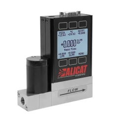Alicat Mass Flow Controller, black body with backlit display and buttons on a stainless steel flow block