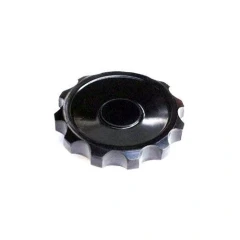 Pellet Press Front Pressure Release Knob, black scalloped plastic knob, close-up, white background