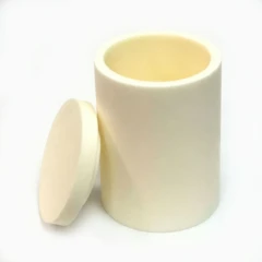 50ml Alumina Ceramic Grinding Jar MAC.50, cream ceramic jar with its lid leaning against it, white background