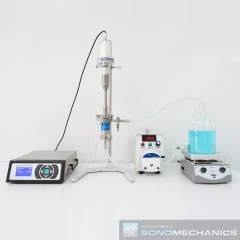 SonoMechanics LSP-600 Ultrasonic Processor, generator, horn on stand, peristaltic pump and bottle on a stirrer