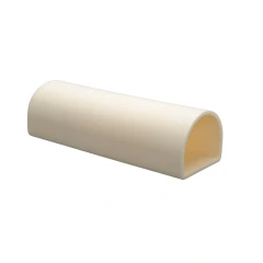 Alumina Ceramic Dee Tubes, cream-coloured half-round ceramic tube open at both ends, white background