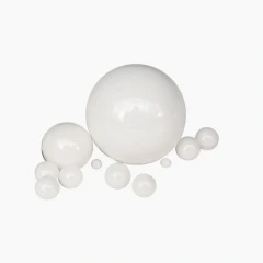 Yttrium Stabilized Zirconia Grinding Balls, white ceramic balls in several sizes, white background
