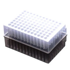 NEST Deep Well Plates, Round Well, Non-Sterile, clear 96-well plate on a smoky grey plate below
