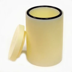50ml Nylon Grinding Jar MNL.50, cream-coloured jar with black O-ring and lid leaning beside it