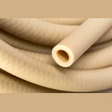 3/8" Reinforced Vacuum Chilling Tubing, close-up of coiled beige tubing with cut end