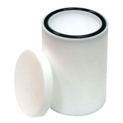 50ml PTFE Grinding Jar MTE.50, white cylindrical jar with black O-ring and its lid leaning against it