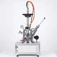 AIVAF-200 Mini 3000C Arc Melting Furnace, stainless chamber with handwheel, gauges and hoses on a white cabinet