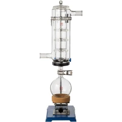 Ai Large Chamber T1 Glass Cold Trap, 24/40, clear glass trap with inner coils over a flask on a blue lab jack