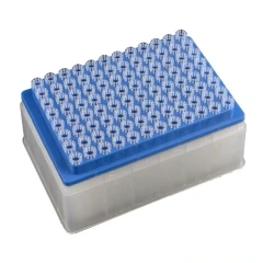 NEST Robotic Tips for Agilent, clear tips in a blue rack on a clear plastic box, white background