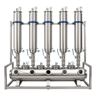 50lb 5-Column Closed Loop Extractor, five stainless columns on a frame over a horizontal collection tank