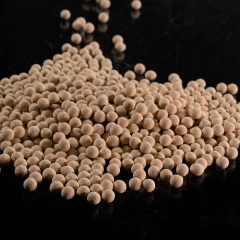 4A molecular sieve beads, tan spheres on a dark background