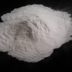 Silica 60A, heap of fine white powder on a dark background