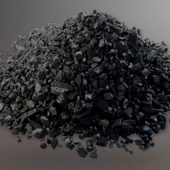 XActive activated carbon, heap of black granules on a grey backdrop
